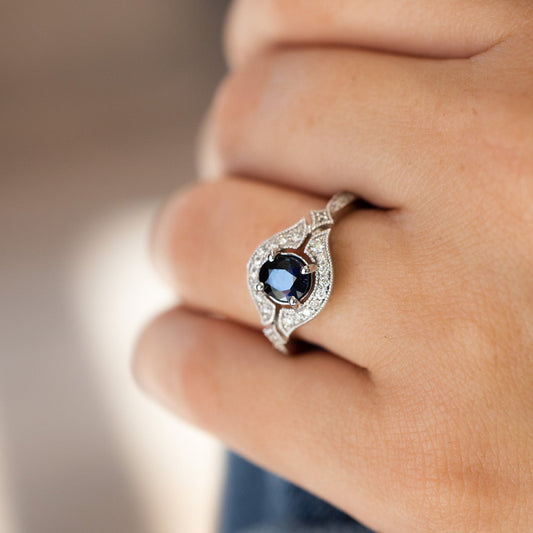 Blue Sapphire Ring on woman's hand