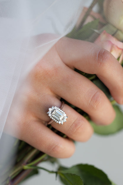 1.01 Carat Emerald Cut Diamond Ring Lab Grow Diamonds Featured on a hand holding flowers