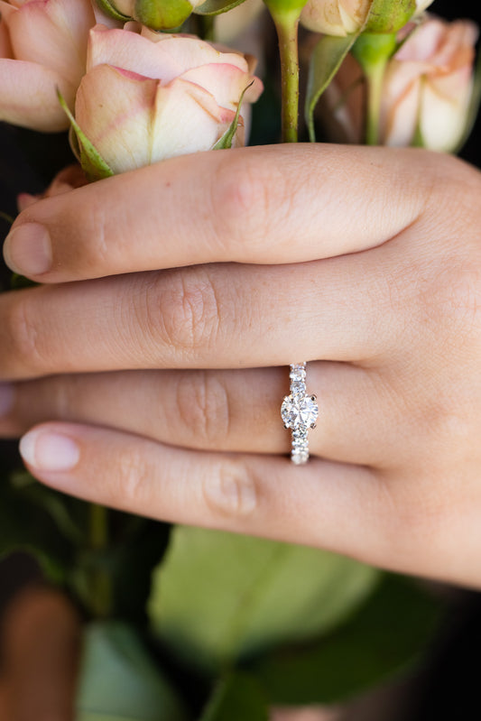 1.94 Carat t.w. Diamond Ring on hand holding roses