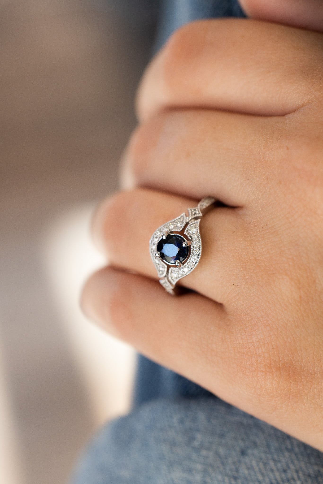 Blue Sapphire Ring on woman's hand