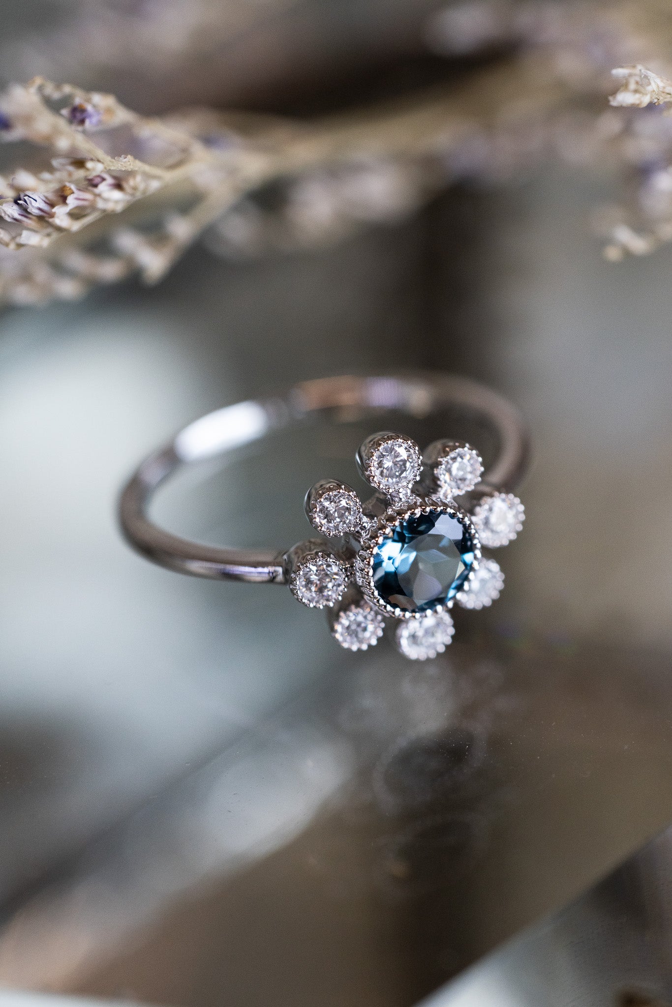 Blue Topaz & Diamond Ring with Floral Background