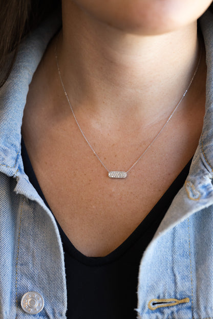 Diamond Pave' Bar Necklace on n neck with denim jacket and black shirt