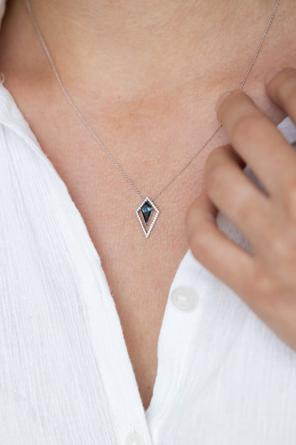 Kite Shape London Blue Topaz Necklace on lady with white shirt 