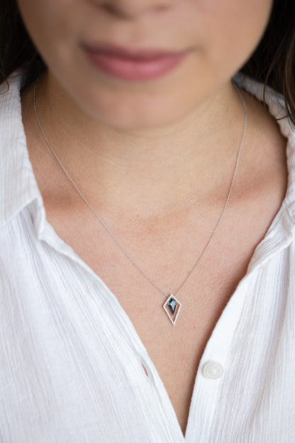Kite Shape London Blue Topaz Necklace on lady with white shirt