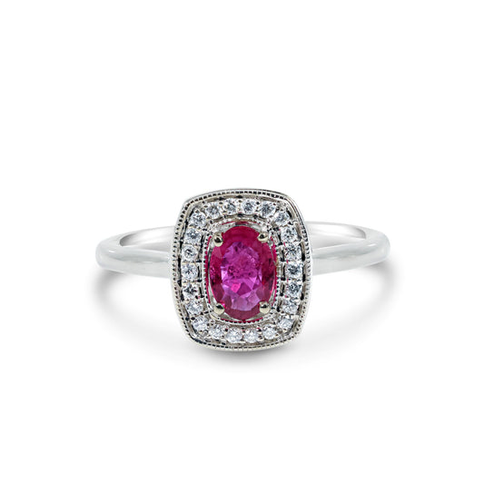 A 10k white gold ring featuring a 0.45 carat oval ruby and small diamond accents.