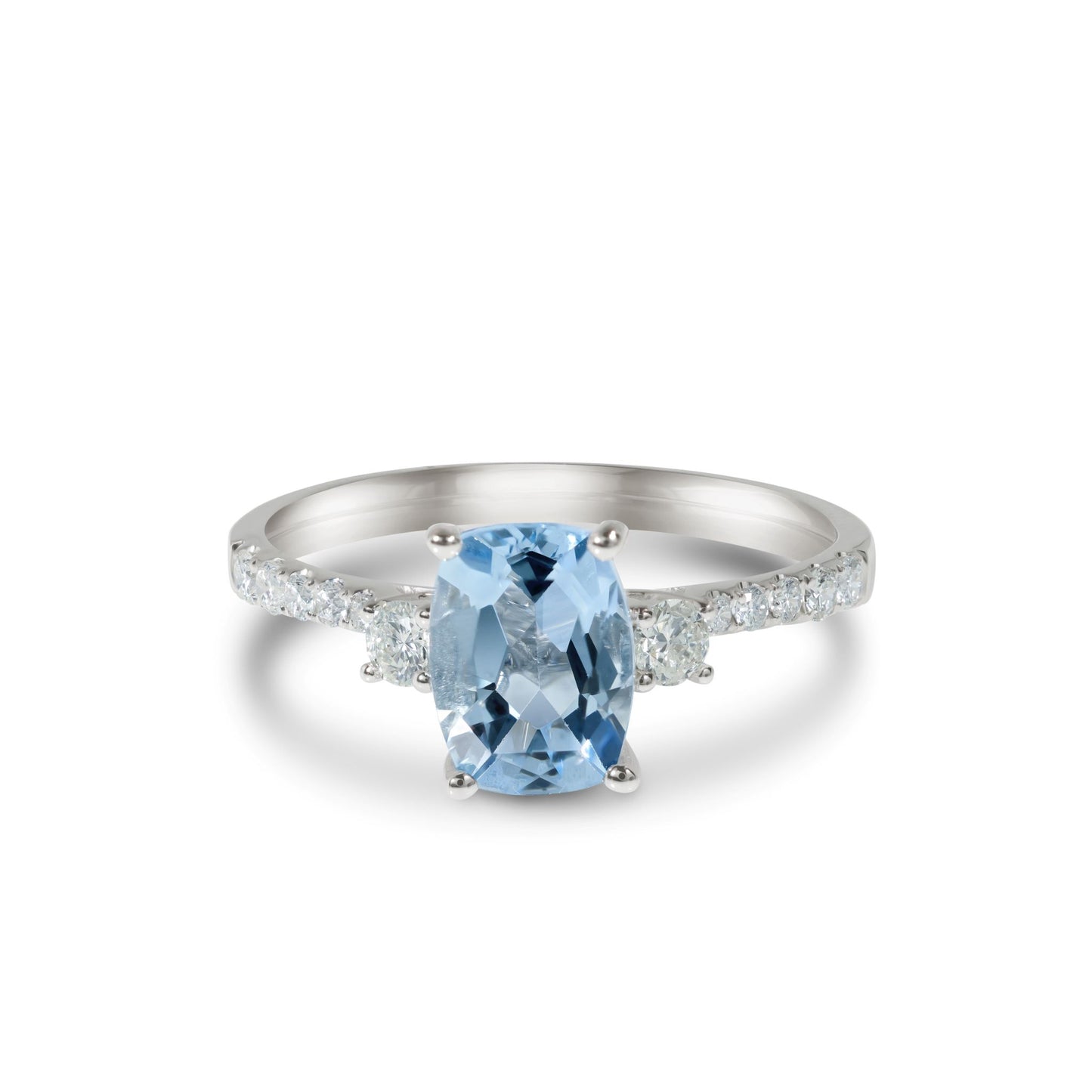 A 14k white gold ring with a 1.18 carat aquamarine center stone and diamond accents.