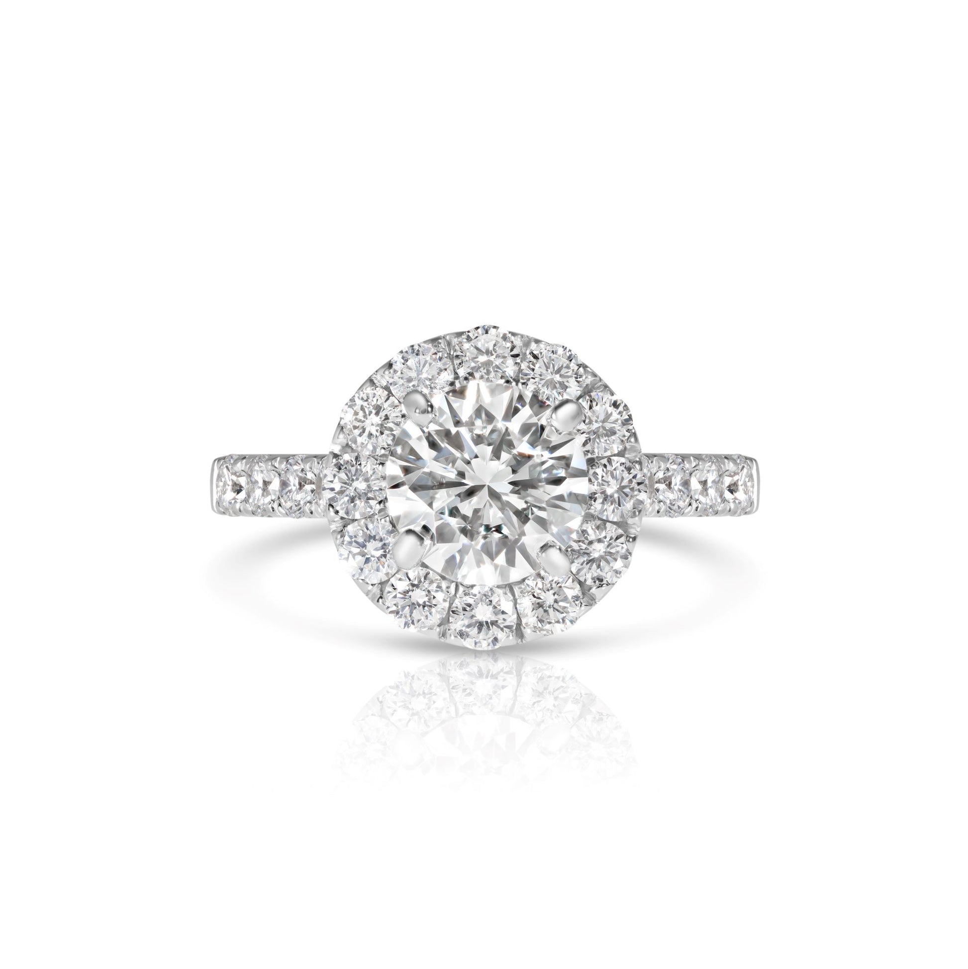 A 14K white gold wedding set featuring a round brilliant cut diamond with accent diamonds.