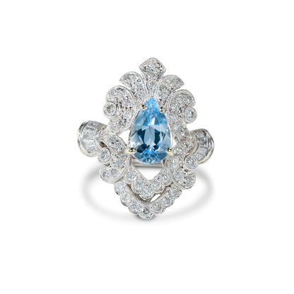Estate platinum ring with a pear-shaped aquamarine center stone and diamond accents, featuring a finger-fit shank.
